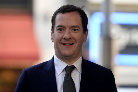 Former Chancellor George Osborne arrives at the Evening Standard offices to formally take up the role of editor of the newspaper in London, Britain, May 2, 2017. REUTERS/Hannah McKay