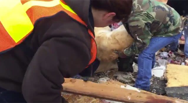 Friends and family member gathered around to see Sawyer pulled from the rubble. Source: Supplied.