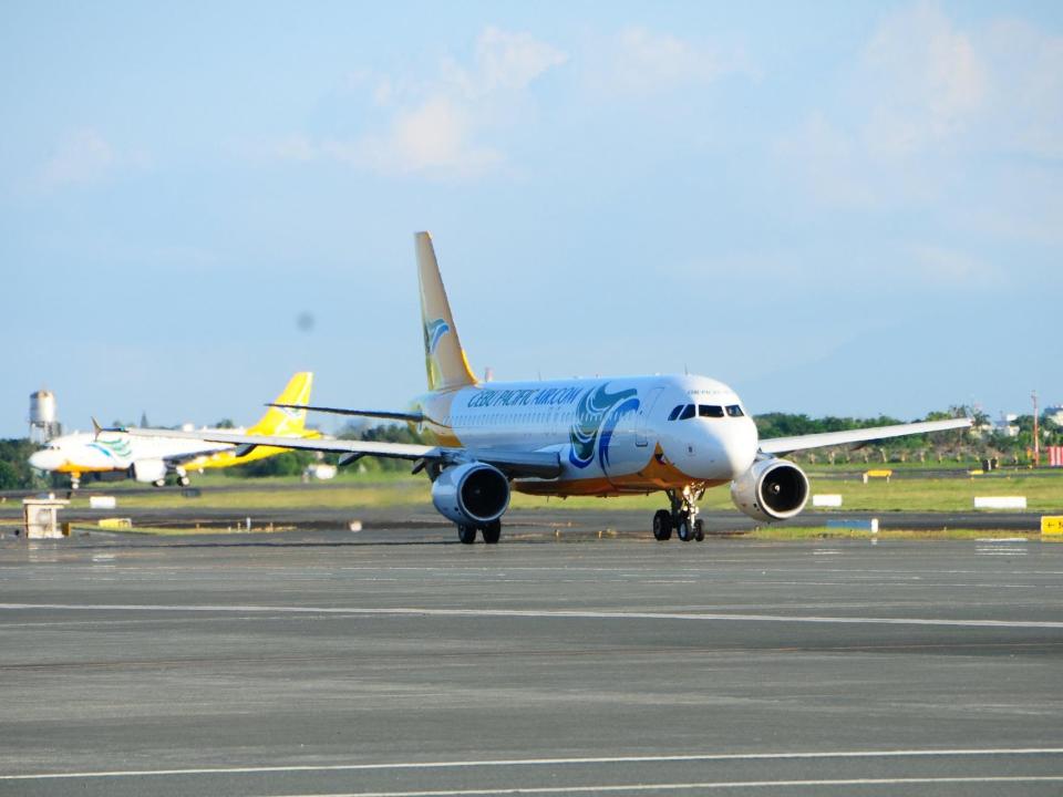 A Cebu Pacific plane on the runway.