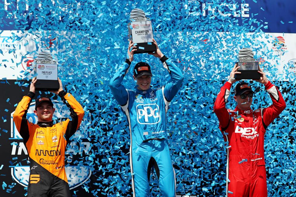 Mar 10, 2024; St. Petersburg, Florida, USA; Indycar driver Josef Newgarden (middle) celebrates winning the Grand Prix of St. Petersburg. Indycar driver Patricio O'Ward (left) celebrates winning second and Indycar driver Scott McLaughlin (right) celebrates winning third Mandatory Credit: Peter Casey-USA TODAY Sports