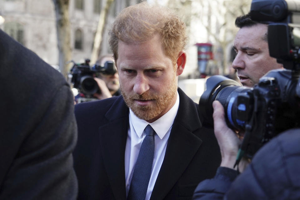 Prince Harry arrives at the Royal Courts Of Justice, in London, Monday, March 27, 2023. Prince Harry is in a London court as the lawyer for a group of British tabloids prepared to ask a judge to toss out lawsuits by the prince, Elton John and several other celebrities who allege phone tapping and other invasions of privacy. (Jordan Pettitt/PA via AP)