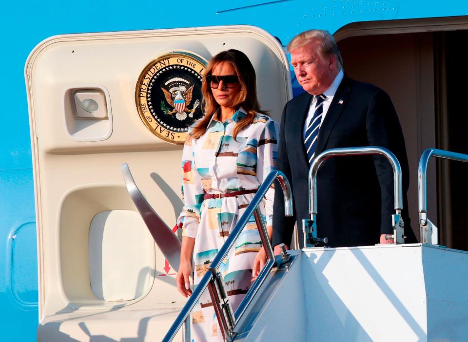 As Donald Trump sets off on his five-country state visit tour, the president’s aides are in for quite the ride. Mr Trump has not travelled often during his tenure as US president, often sending cabinet members or top aides on state visits, citing a focus on domestic issues.However, this reluctance may be influenced by Mr Trump dislike of international travel. One official described travelling with the US president on Air Force One as "like being held captive".According to CNN, who interviewed five anonymous officials within the administration, the trips are chaotic.There is incredibly limited sleeping space, they said, and Fox News is constantly blaring on the TV. Mr Trump brings boxes full of magazines, newspapers and hours of pre-recorded cable footage on board to review how he’s seen in the media, sometimes waking staffers to discuss and draft a response to a bad headline, telling the staffers to “fix it” rather than review materials for his upcoming meetings.The president also reportedly refuses to sleep. Mr Trump has previously made claims that he only sleeps four to five hours a night, but staffers report it’s even less on the plane, as he stays up to talk business, sports, and gossip.Mr Trump plans his travel to minimise time abroad, being described as an impatient traveller who prefers his own bed. The president has been known to cut state visits short and change schedules, as he did at the Hanoi summit in Singapore last year, creating short deadlines and high stress for staffers.As for accommodations, Mr Trump allegedly berates staffers when his hotel is not up to his personal standards. The president also demands access to Fox News and multiple televisions. It is well-documented that White House trips to other nations are not pleasurable, with strenuous hours and packed agendas, but multiple Trump Administration officials have noted that overseas travel with Mr Trump are “easily the worst”.