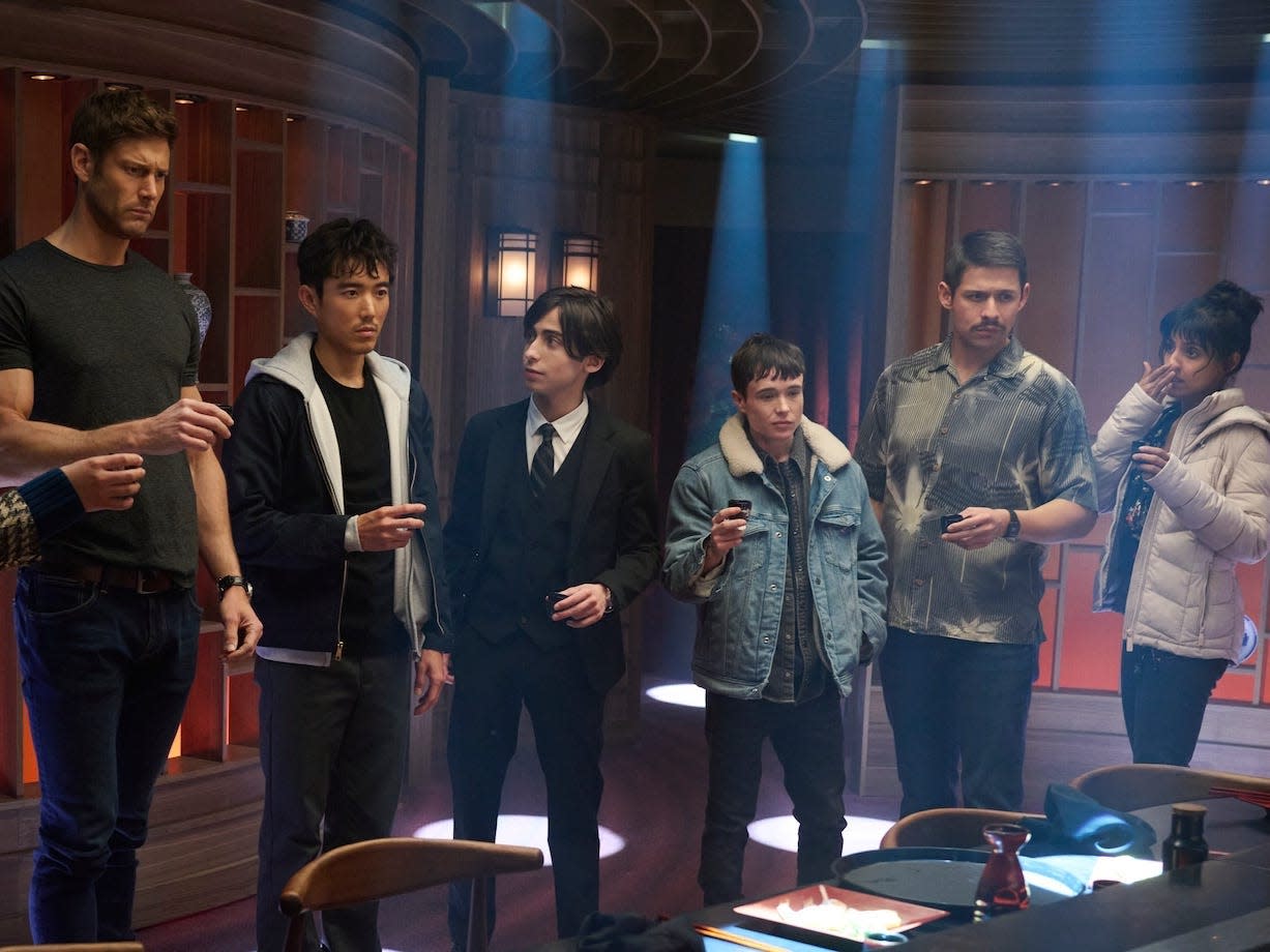 Robert Sheehan as Klaus Hargreeves, Emmy Raver-Lampman as Allison Hargreeves, Tom Hopper as Luther Hargreeves, Justin H. Min as Ben Hargreeves, Aidan Gallagher as Number Five, Elliot Page as Viktor Hargreeves, David Castañeda as Diego Hargreeves, Ritu Arya as Lila Pitts in the first look of "The Umbrella Academy."