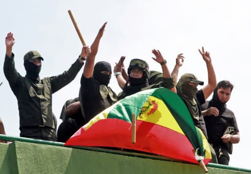 Policemen demonstrate at their headquarters in Santa Cruz, Bolivia, on November 9, 2019 after joining protests against President Evo Morales following a disputed election