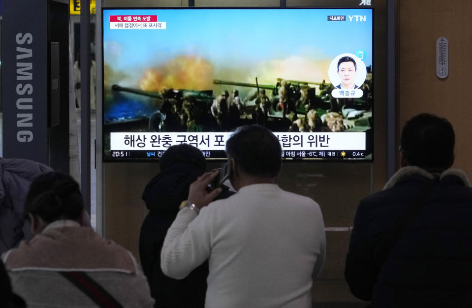 A TV screen shows a file image of North Korea's military exercise during a news program at the Seoul Railway Station in Seoul, South Korea, Saturday, Jan. 6, 2024. North Korea conducted a new round of artillery drills near the disputed sea boundary with South Korea on Saturday, officials in Seoul said, a day after the North's earlier exercises prompted South Korea to respond with its own drills in the same area. (AP Photo/Ahn Young-joon)