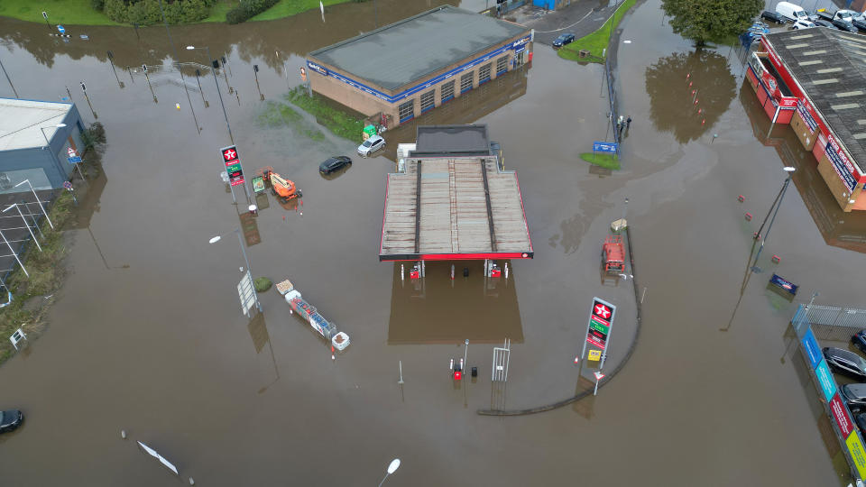 DERBY, UNITED KINGDOM - OCTOBER 21: In this aerial view a petrol station is flooded in the Pentagon area of Derby after the River Derwent burst its banks during storm Babet on October 21, 2023 in Derby, United Kingdom. Weather warnings are in place in Scotland and England as Storm Babet sweeps the country. (Photo by Christopher Furlong/Getty Images)