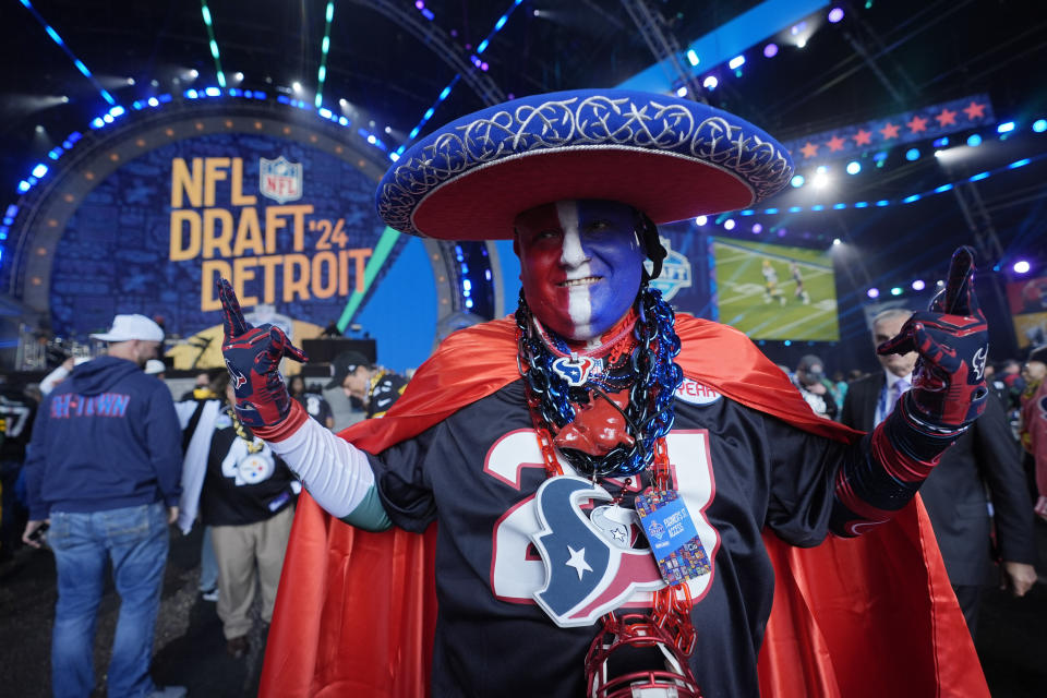 A Houston Texans fan attends the first round of the NFL football draft, Thursday, April 25, 2024, in Detroit. (AP Photo/Paul Sancya)