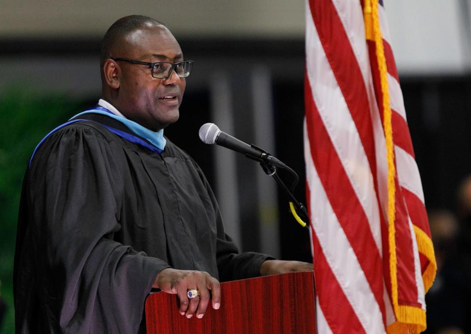 Principal Darren Edgecomb speaks during the Palm Beach Central High School graduation ceremonies in 2021. Edgecomb, along with two assistant principals and a music teacher, were arrested Monday and charged with failing to report sexual abuse.