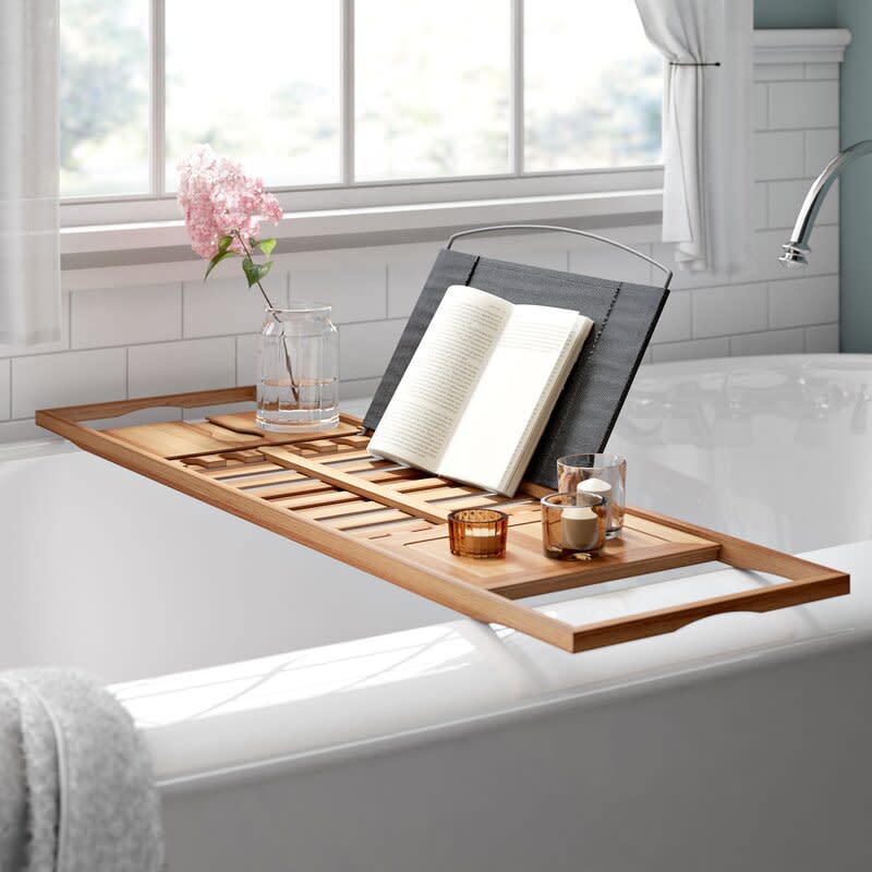 <p><a href="https://go.redirectingat.com?id=74968X1596630&url=https%3A%2F%2Fwww.wayfair.com%2F--%2Fpdp%2Frebrilliant--gardner-bamboo-bath-caddy-x211190999-l6511-w005064558.html&sref=https%3A%2F%2Fwww.esquire.com%2Flifestyle%2Fg23477356%2Fbest-gifts-for-book-lovers%2F" rel="nofollow noopener" target="_blank" data-ylk="slk:Shop Now;elm:context_link;itc:0;sec:content-canvas" class="link ">Shop Now</a></p><p>Gardner Bamboo Bath Caddy</p><p>wayfair.com</p><p>$42.00</p>