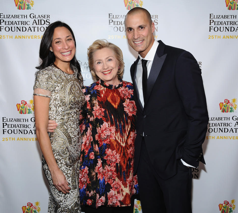 NEW YORK, NY - DECEMBER 03:  (L-R) Cristen Barker, Global Impact Award Recipient Hillary Rodham Clinton and Photographer Nigel Barker attend Elizabeth Glaser Pediatric AIDS Foundation's Global Impact Award Gala Dinner Honoring Hillary Clinton at Best Buy Theater on December 3, 2013 in New York City.  (Photo by Gary Gershoff/Getty Images for Elizabeth Glaser Pediatric AIDS Foundation)