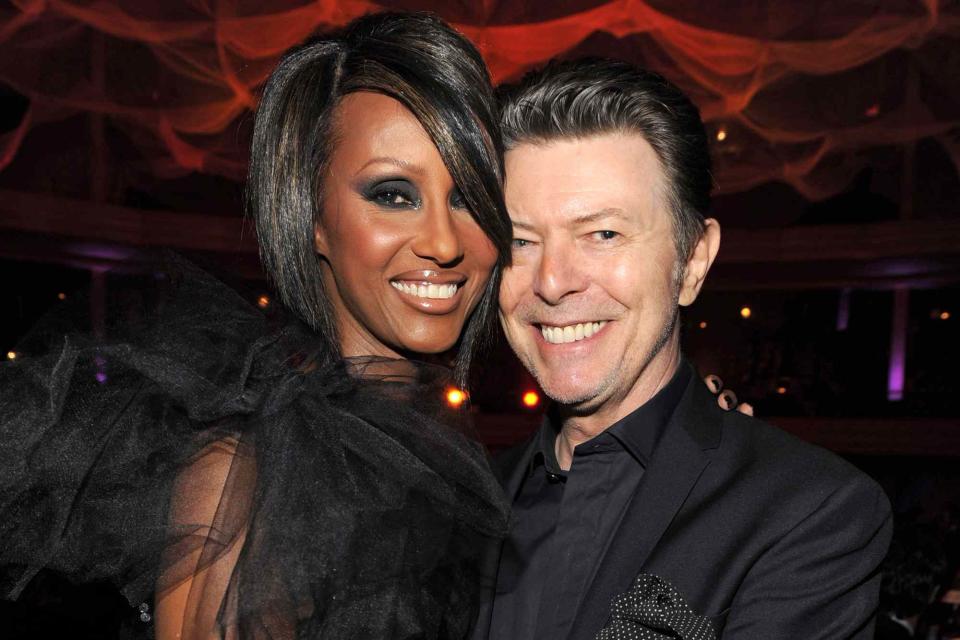 <p>Kevin Mazur/WireImage</p> Iman and David Bowie.