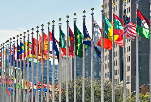 <span class="caption">Flags fly outside the UN building in New York.</span> <span class="attribution"><a class="link " href="https://www.shutterstock.com/image-photo/flags-all-nations-outside-un-new-545605258" rel="nofollow noopener" target="_blank" data-ylk="slk:Andrew F. Kazmierski/Shutterstock;elm:context_link;itc:0;sec:content-canvas">Andrew F. Kazmierski/Shutterstock</a></span>