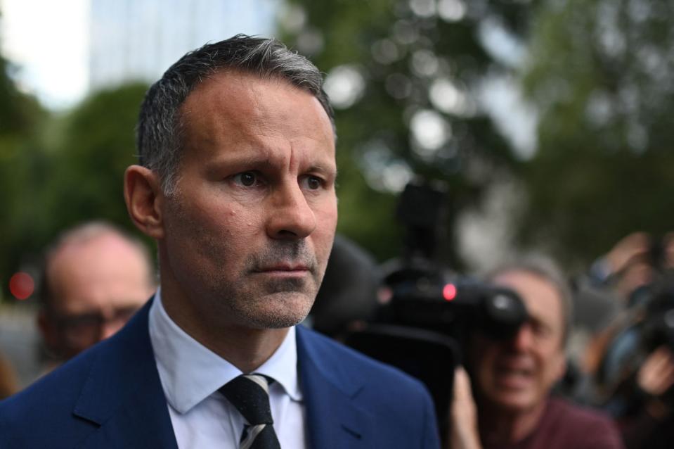 Former Manchester United star and Wales manager Ryan Giggs reacts as he leaves the Manchester Minshull Street Crown Court, in Manchester, on August 31, 2022 at the end of his trial for assaulting his ex-girlfriend. - A jury was discharged on August 31, 2022 after failing to reach a verdict in the domestic violence case against former Manchester United winger Ryan Giggs. Giggs, 48, has been on trial accused of controlling and coercive behaviour against his former girlfriend Kate Greville, assaulting her and her younger sister. (Photo by Oli SCARFF / AFP) (Photo by OLI SCARFF/AFP via Getty Images)