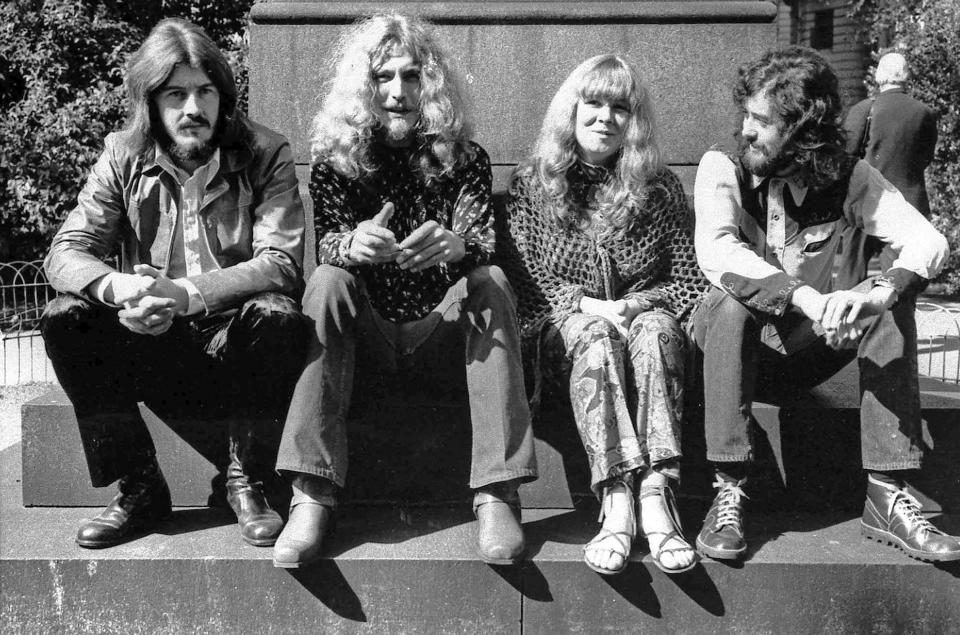 FILE - In this September 1970 file photo, members of the rock group Led Zeppelin and singer Sandy Denny pose in London after receiving their awards in the Melody Maker Pop Poll in London. From left are John Bonham, Robert Plant, Denny and Jimmy Page. A federal appeals court on Monday, March 9, 2020, restored a jury verdict that found Led Zeppelin did not steal “Stairway to Heaven." (AP Photo, File)