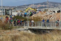 Environmental activists on bicycles arrive to protest in the dried out riverbed of Cijevna River in Dinosa village, near Tuzi, Montenegro October 20, 2018. REUTERS/Stevo Vasiljevic