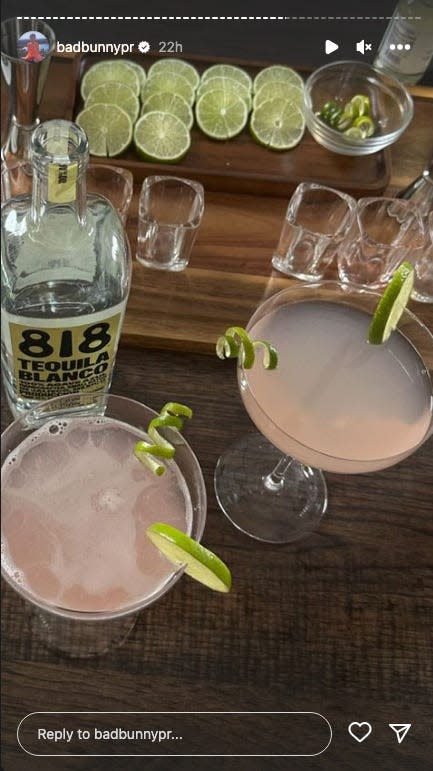bad bunny's instagram story, showing two pink cocktails garnished with lime. there's a bottle of 818 tequila nearby