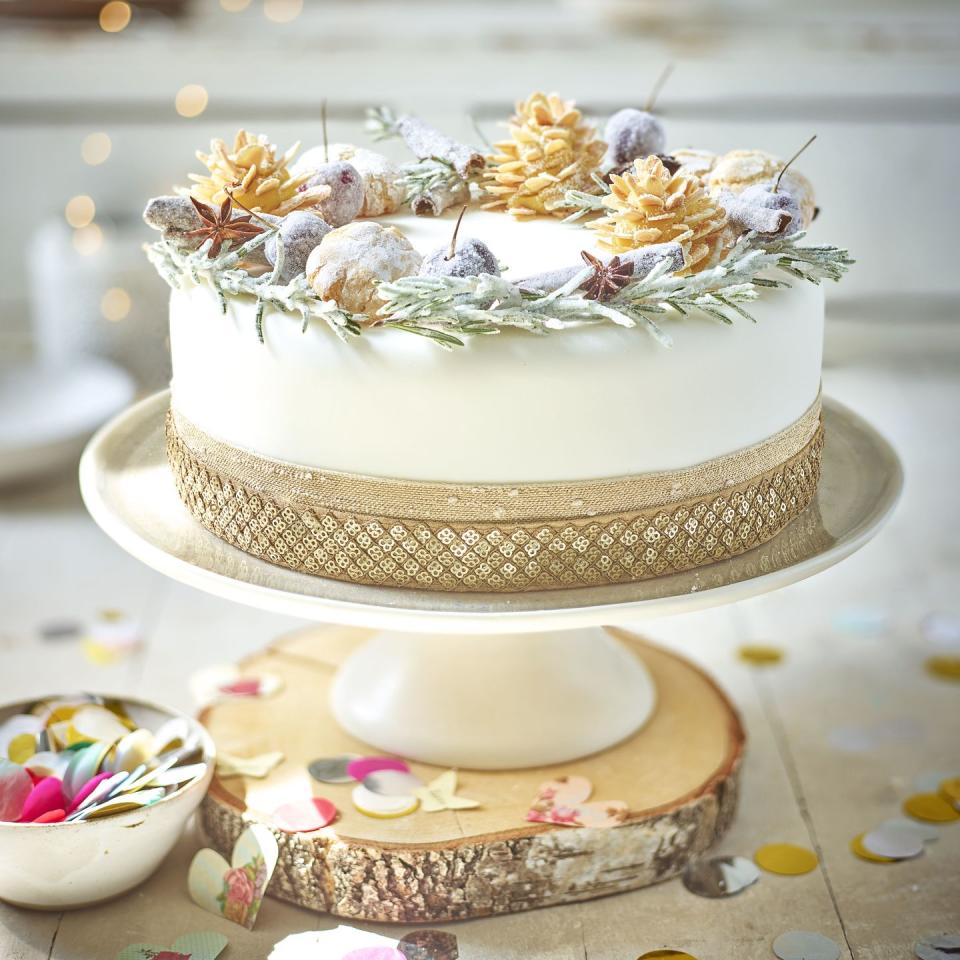 <p>A simple yet elegant decoration idea to decorate your Christmas cake. We’ve topped with our <a href="https://www.goodhousekeeping.com/uk/food/recipes/a25304171/amaretti-biscuits/" rel="nofollow noopener" target="_blank" data-ylk="slk:Amaretti biscuits;elm:context_link;itc:0;sec:content-canvas" class="link ">Amaretti biscuits</a> for added festive flavour and flair. </p><p><strong>Recipe: <a href="https://www.goodhousekeeping.com/uk/christmas/christmas-recipes/a34874728/acorn-wreath-cake/" rel="nofollow noopener" target="_blank" data-ylk="slk:Acorn Wreath Cake;elm:context_link;itc:0;sec:content-canvas" class="link ">Acorn Wreath Cake</a></strong></p>