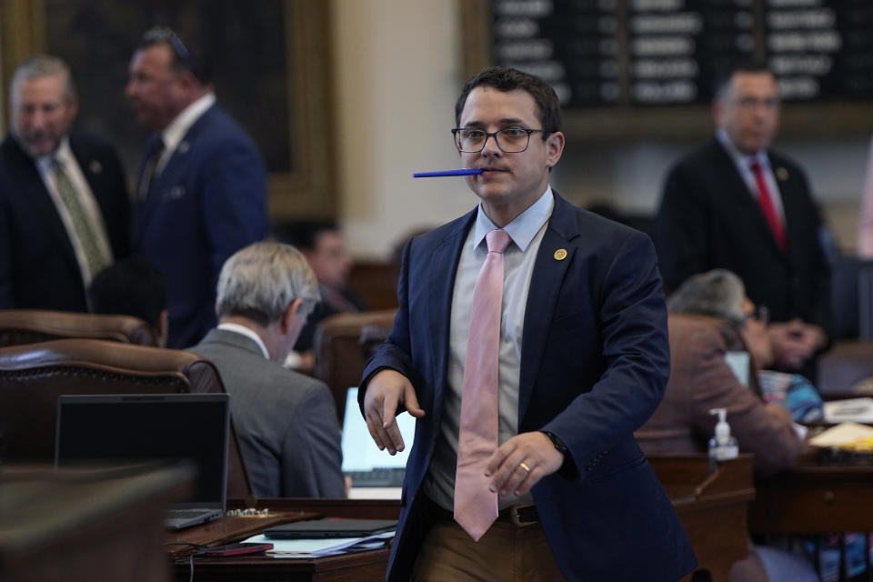 Texas state Rep. Briscoe Cain, R-Baytown, walks through the House Chamber during debate on a voting bill at the Texas Capitol in Austin, Texas, Tuesday, May 23, 2023. (AP Photo/Eric Gay)