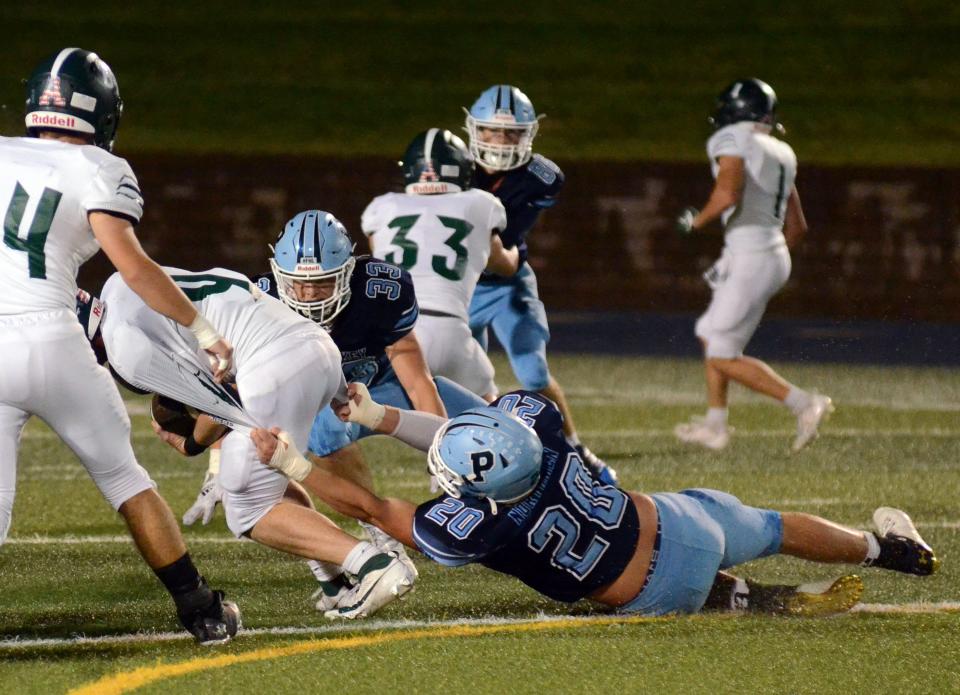 Petoskey senior Korbin Sulitis rips down an Alpena player from behind in another strong defensive showing for the Northmen.