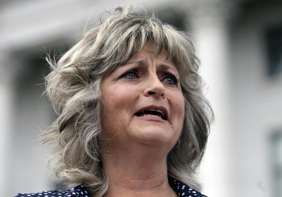 FILE - This Saturday, March 5, 2016, file photo, Jeanette Finicum speaks with reporters during a rally at the Utah State Capitol, in Salt Lake City. Finicum, the widow of an Arizona rancher LaVoy Finicum killed by FBI agents in a Jan. 26, 2016, traffic stop in central Oregon, is planning to hold a meeting in John Day, Ore., Jan. 28, 2017, with their children, in an effort to continue with his mission. (AP Photo/Rick Bowmer, file)