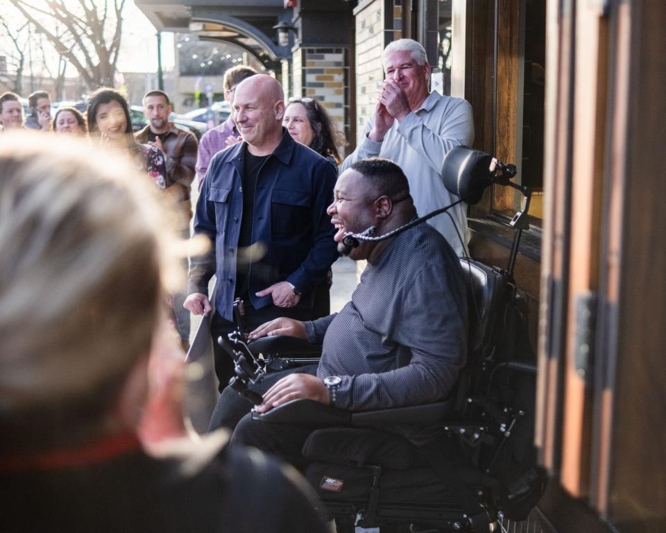 Eric LeGrand celebrates the first anniversary of Eric LeGrand Kentucky Straight Bourbon Whiskey at The Office Tavern Grill in Summit on March 15.