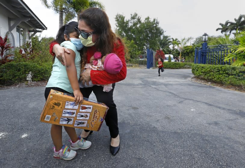 =Nicaraguan-American businesswoman Nora Sandigo welcomes migrant families to her home on the outskirts of Miami