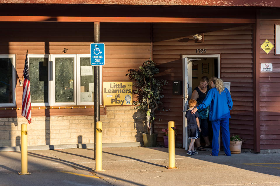 Deborah VanderGaast, director of Tipton Adaptive Daycare, greets Wilkinson on Aug. 17, 2022, while preparing to close the daycare permanently.<span class="copyright">Kathryn Gamble for TIME</span>