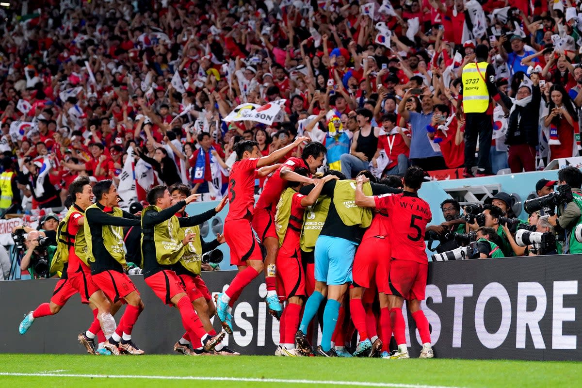 South Korea players celebrate their winner against Portugal (Adam Davy/PA). (PA Wire)
