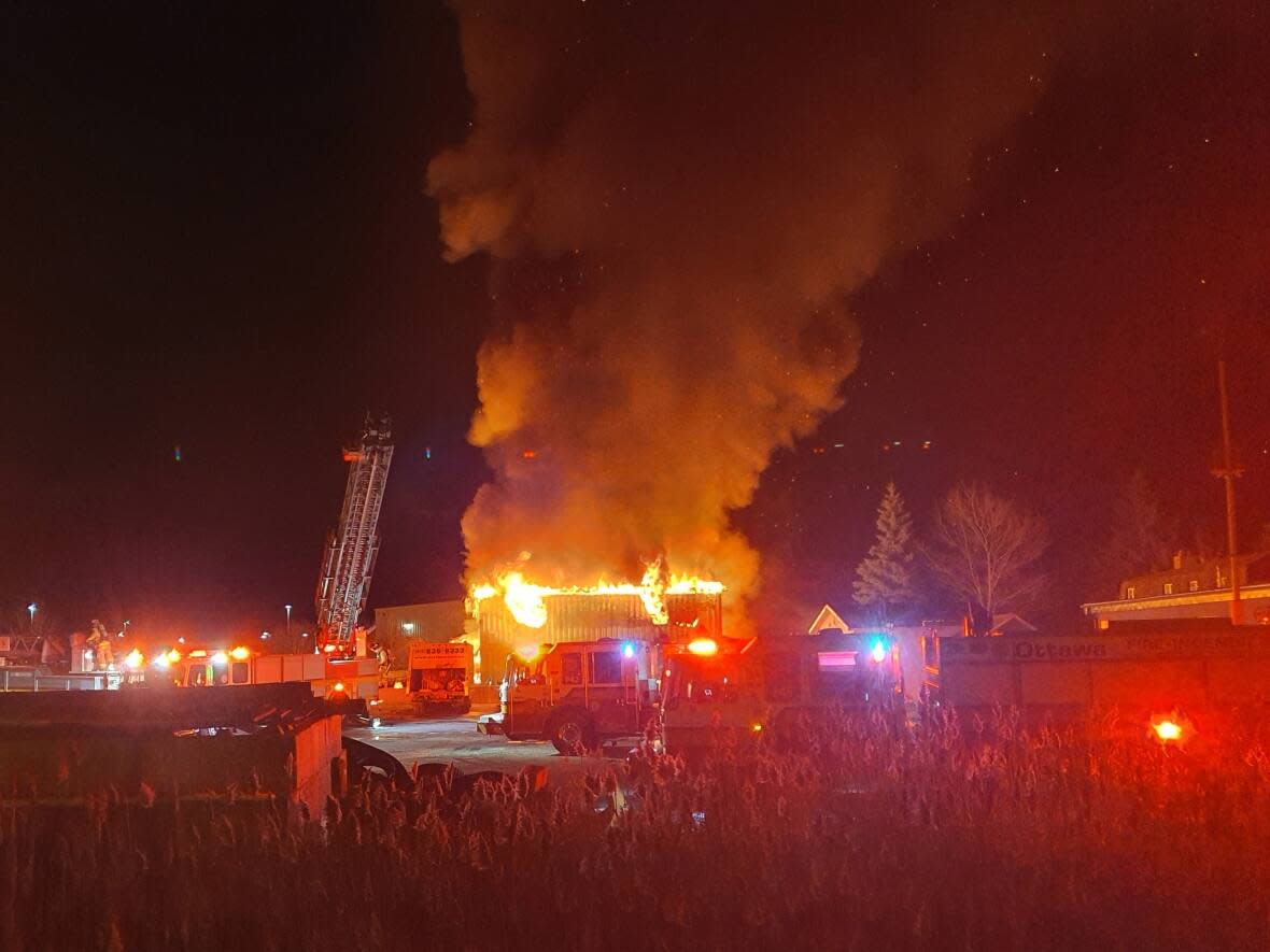 Firefighters called to a commercial building on Moonstone Drive on Nov. 24, 2022, could see the flames from a distance, according to Ottawa Fire Services. (David Tischhauser - image credit)