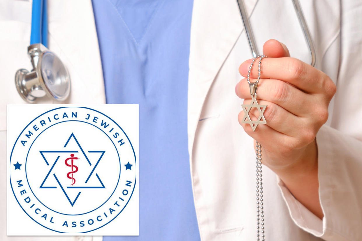 A person holding a necklace at a gathering of Jewish doctors launching an advocacy group