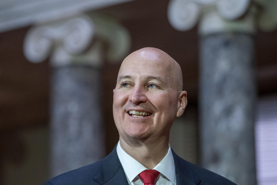 Sen. Pete Ricketts, R-Neb., smiles as Vice President Kamala Harris arrives, Monday, Jan. 23, 2023, for his ceremonial swearing-in on Capitol Hill in Washington. (AP Photo/Jacquelyn Martin)