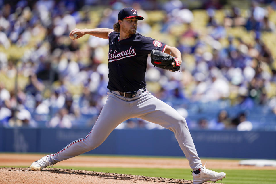 Washington Nationals starting pitcher Jake Irvin throws during the fourth inning of a baseball game against the Los Angeles Dodgers, Wednesday, April 17, 2024, in Los Angeles. (AP Photo/Ryan Sun)