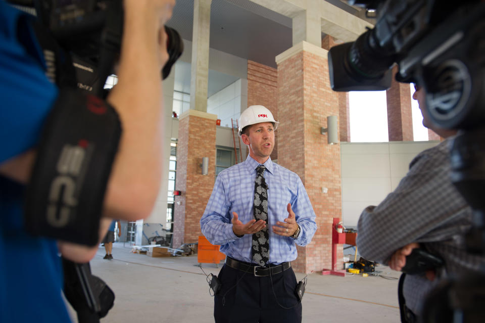 Christian Herr, an Associate Principal with PBK Architects, fields questions from the media on Aug. 3 regarding construction of the new Allen Eagle Stadium. (Michael Prengler/Special Contributor/AP Photo)