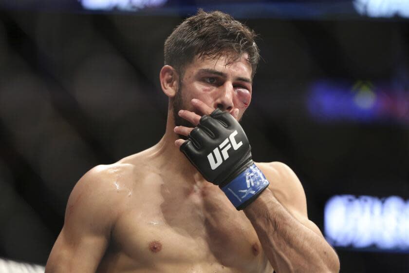 Yair Rodriguez is seen after the first round of his fight against Frankie Edgar in a mixed martial arts bout at UFC 211 on Saturday, May 13, 2017, in Dallas. Edgar won by doctor stoppage after round 2. (AP Photo/Gregory Payan)