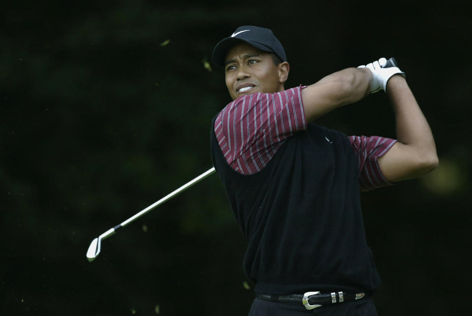 Tiger Woods goes back to 2002 for his best shot of his career. (Andrew Redington/Getty Images)