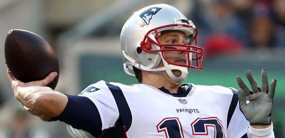 Tom Brady sets to release a pass against the New York Jets.
