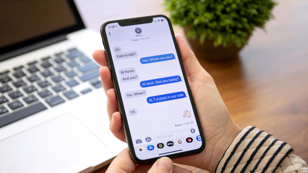  Image showing iPhone with iMessage app open 