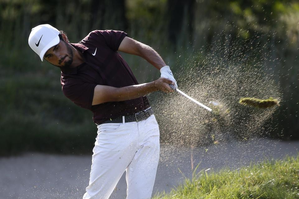 Abraham Ancer takes his shot from the fairway on the 15th hole during the third round of the Dell Technologies Championship golf tournament at TPC Boston in Norton, Mass., Sunday, Sept. 2, 2018. (AP Photo/Michael Dwyer)