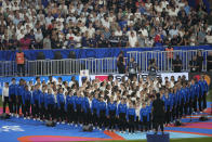 A choir performs before the Rugby World Cup Pool A match between France and New Zealand at the Stade de France in Saint-Denis, north of Paris, Friday, Sept. 8, 2023. (AP Photo/Themba Hadebe)