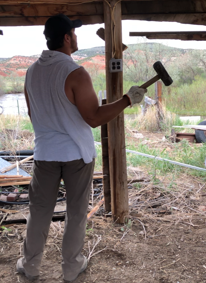 Jaguars defensive tackle Taven Bryan holds a sledgehammer while working this summer in Lander, Wyoming at his RV park, a 13.7-acre property that he and his father, Brandy, are renovating. It is scheduled to open in 2021.