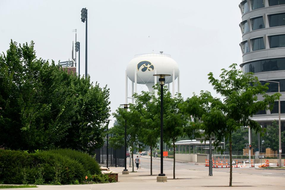 A water tower outside Kinnick Stadium and the University of Iowa Hospitals & Clinics is seen through smoke from wildfires in Canada, Wednesday, June 28, 2023, in Iowa City, Iowa.