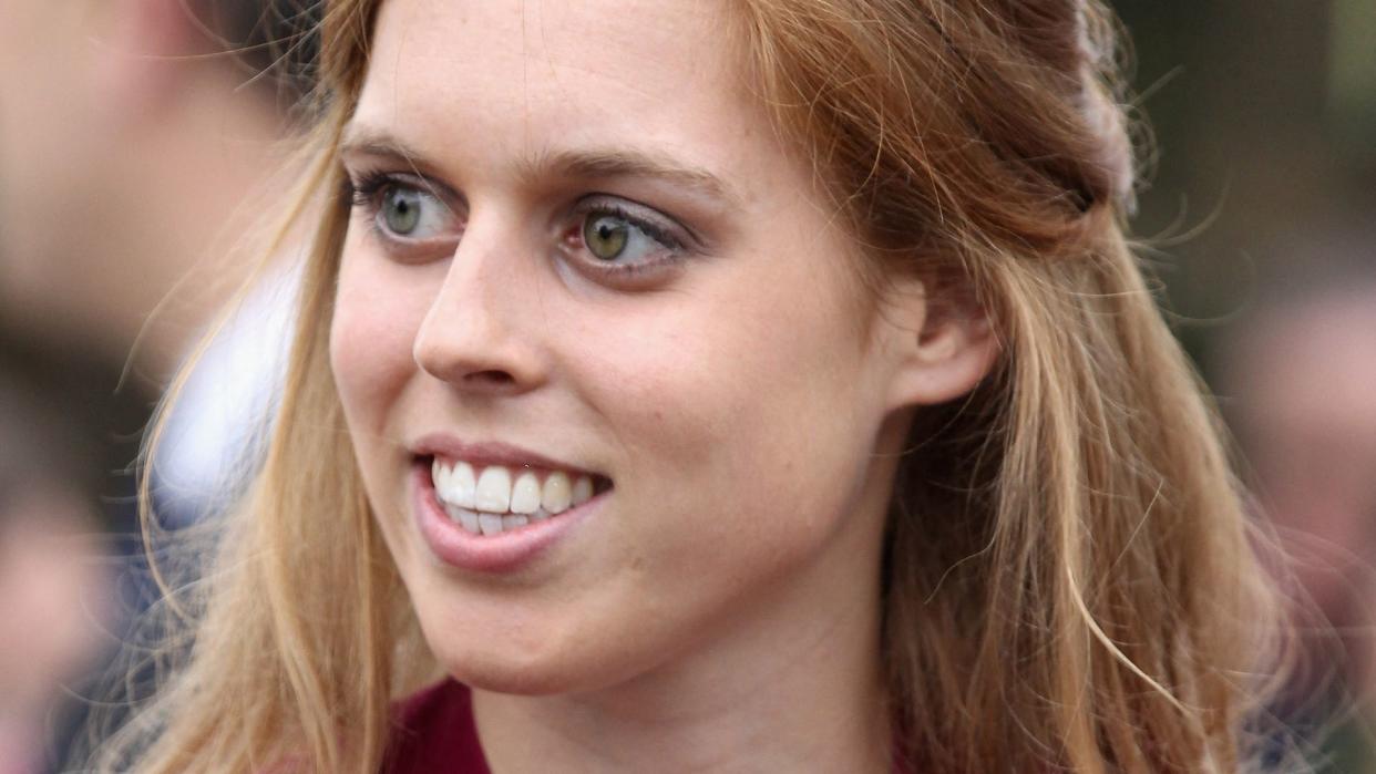 Britain's Princess Beatrice wearing a purple dress at the Chelsea Flower Show in 2011