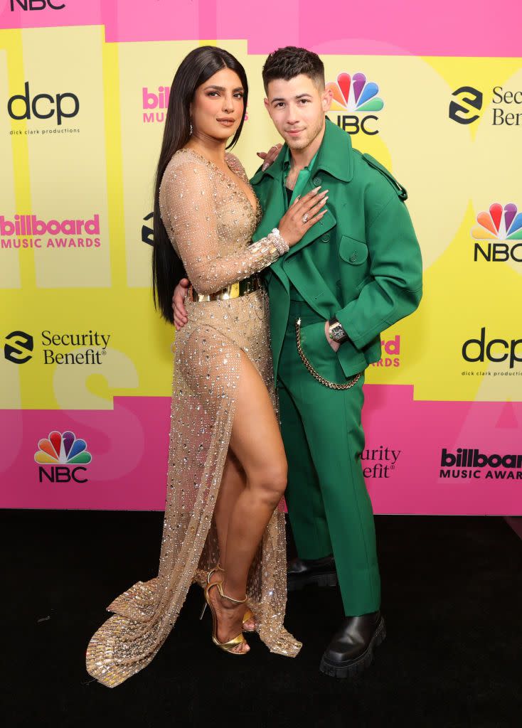 <p>The couple attended the 2021 Billboard Music Awards in Los Angeles on May 24 where Nick Jonas co-hosted the show and performed with the Jonas Brothers.</p><p>Cuddling up on the red carpet, Chopra wore a custom Dolce & Gabbana sheer gown with embroidered diamonds and Bulgari jewellery while Jonas wore a green suit and jacket by Fendi.</p>