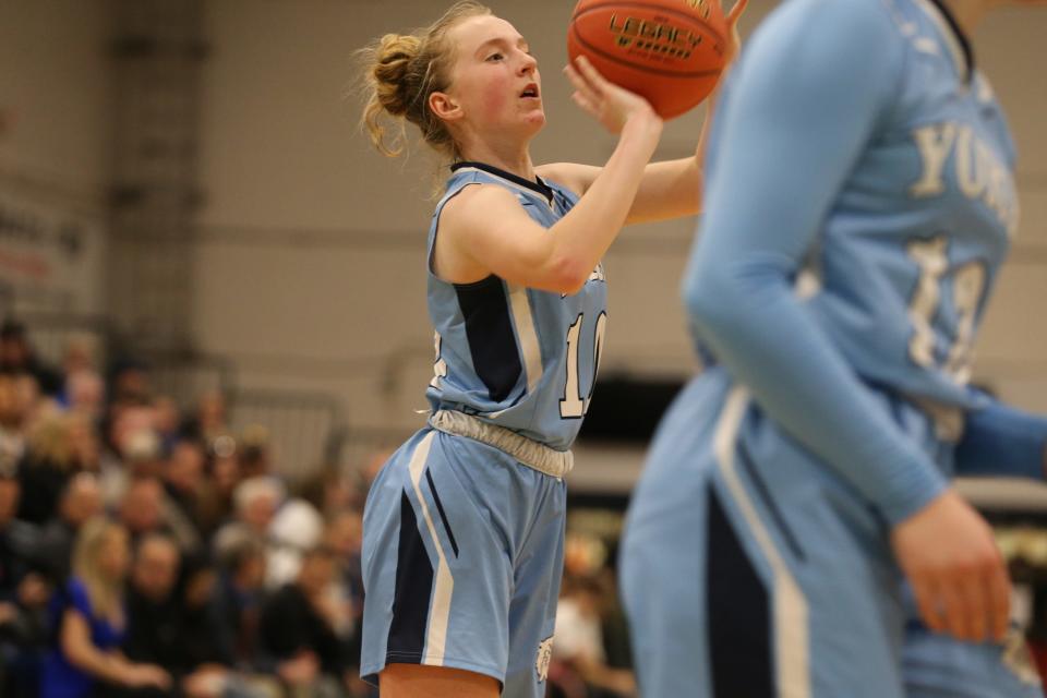 York High School freshman Nya Avery puts up a shot during Saturday's Class B South quarterfinal against Spruce Mountain at the Portland Expo. Avery scored 12 points in the loss.