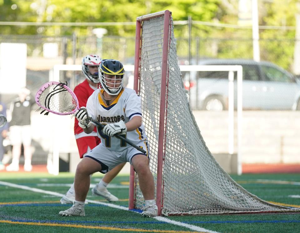 Lourdes goalie Atticus Eglinski (99) works the crease during their 16-15 win over Goshen in boys lacrosse action Our Lady of Lourdes High School in Poughkeepsie on Friday, May 5, 2023. 