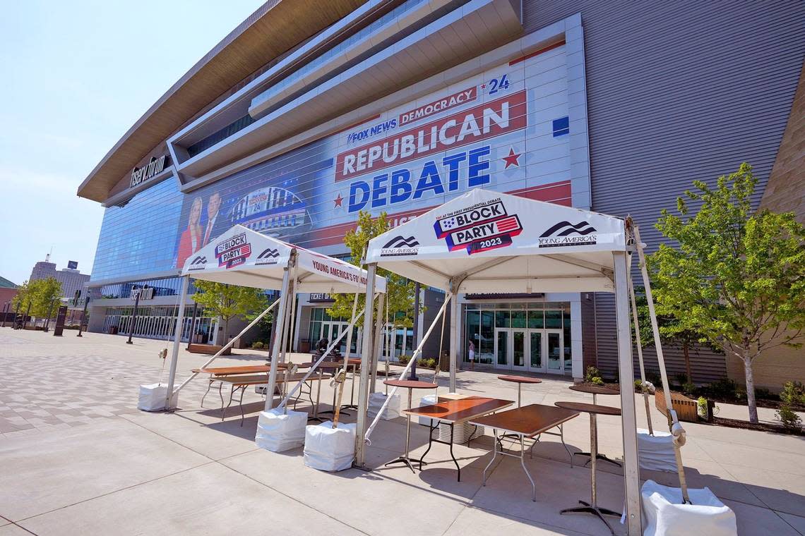 Canopies are set up for a block party by members of the Young America’s Foundation, led by former Wisconsin Gov. Scott Walker, before the August 23 Republican presidential debate, outside Fiserv Forum in Milwaukee on Monday.