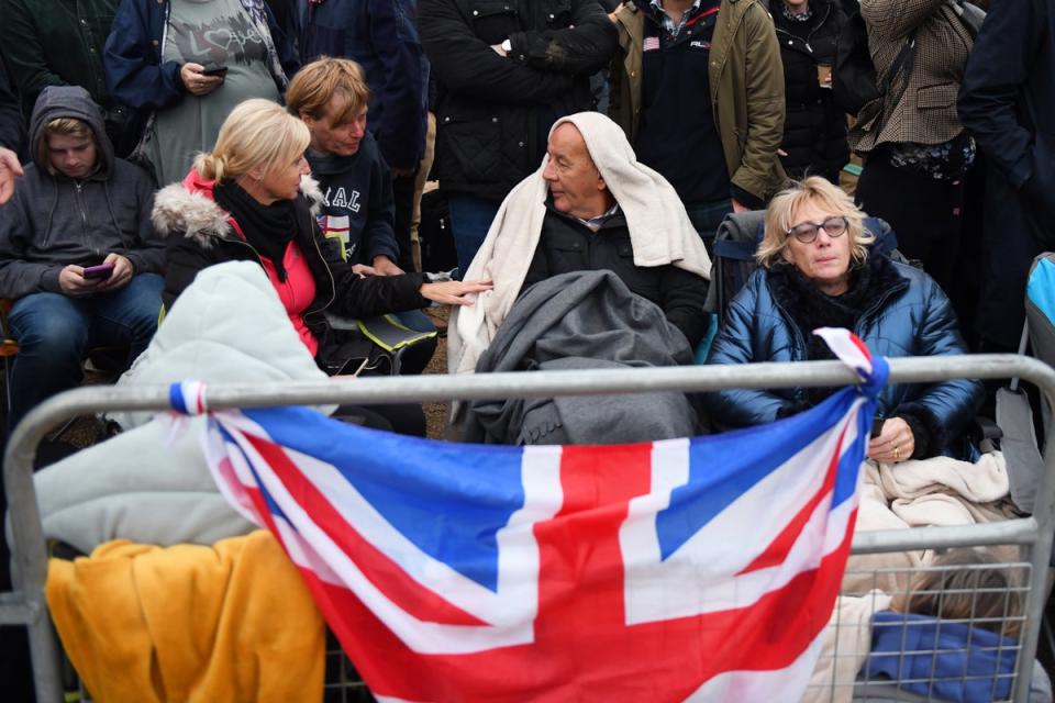 Mourners wait Police on Horse Guards in London ahead of the funeral (Chris J Ratcliffe/PA) (PA Wire)