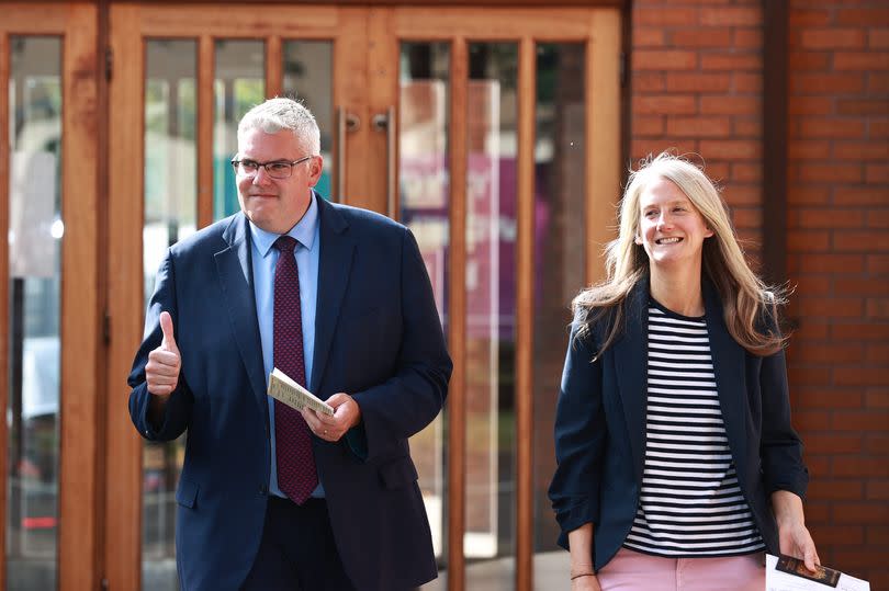DUP leader Gavin Robinson and his wife Lindsay leave after after casting their votes in the 2024 General Election at Dundonald Elim Church
