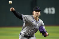 Colorado Rockies pitcher Ryan Feltner throws to an Arizona Diamondbacks batter during the first inning during a baseball game Sunday, March 31, 2024, in Phoenix. (AP Photo/Rick Scuteri)