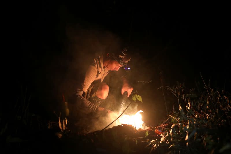 The Wider Image: Taiwan plant hunters race to collect rare species before they are gone